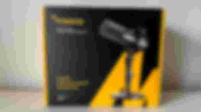 Black and yellow box with a picture of a black mic on the front.