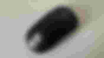 Black mouse with Logitech's logo in white on top.